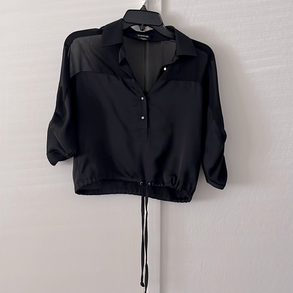 Bebe 3/4 sleeve top sheet at the top